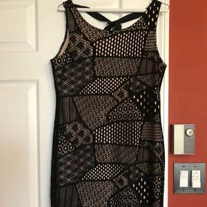Dress ,size l has some stretch to it ,never worn